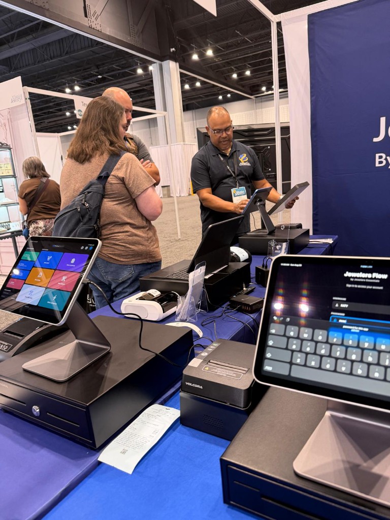 Jewelers Flow iPad registers, cash drawers, and a thermal printer on the show counter